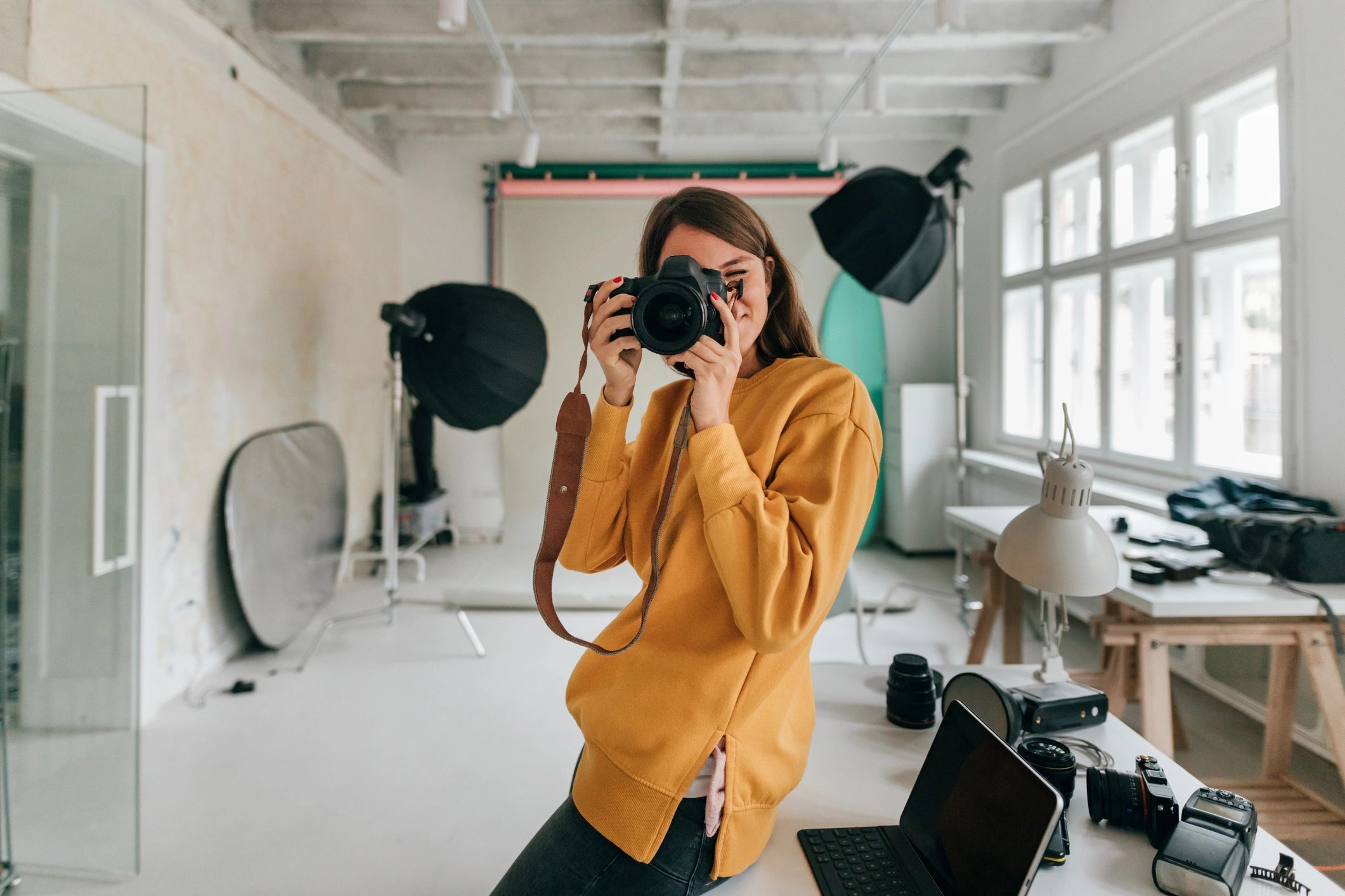 professional photographer at work, modern, creative lighting